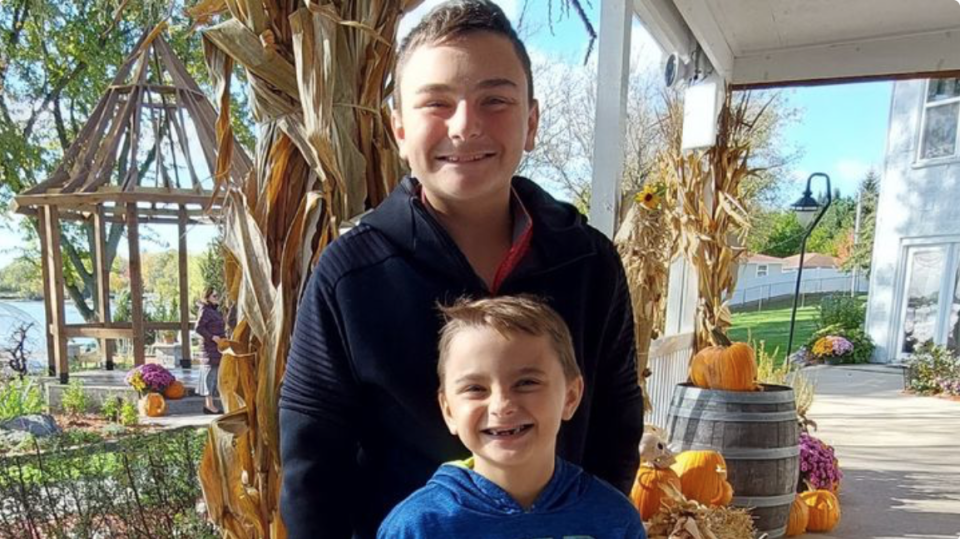 Eight-year-old Jackson Sparks died of injuries sustained in the attack on Tuesday. He is pictured (front) with his brother Tucker, who was also injured (GoFundMe)