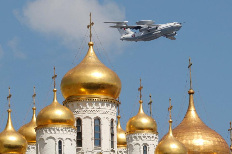 A Russian A-50 early warning aircraft flies above a cathedral during the Victory Day Parade in Moscow, in June 2020 (REUTERS)