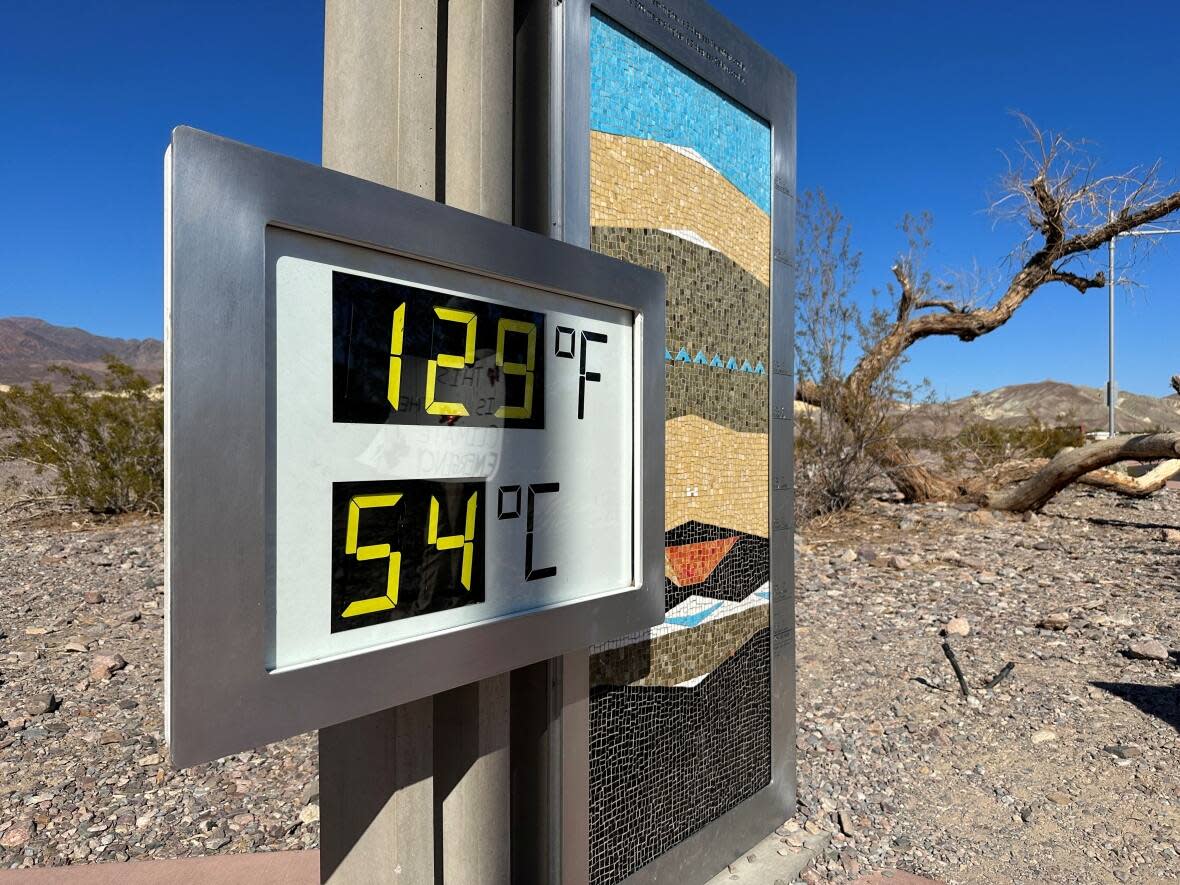 A view of a digital sign displaying the high temperature in Death Valley, Calif., on July 15, 2023. Global temperatures hit a record that month, and the year ended up being the hottest on record.  (Jorge Garcia/Reuters - image credit)