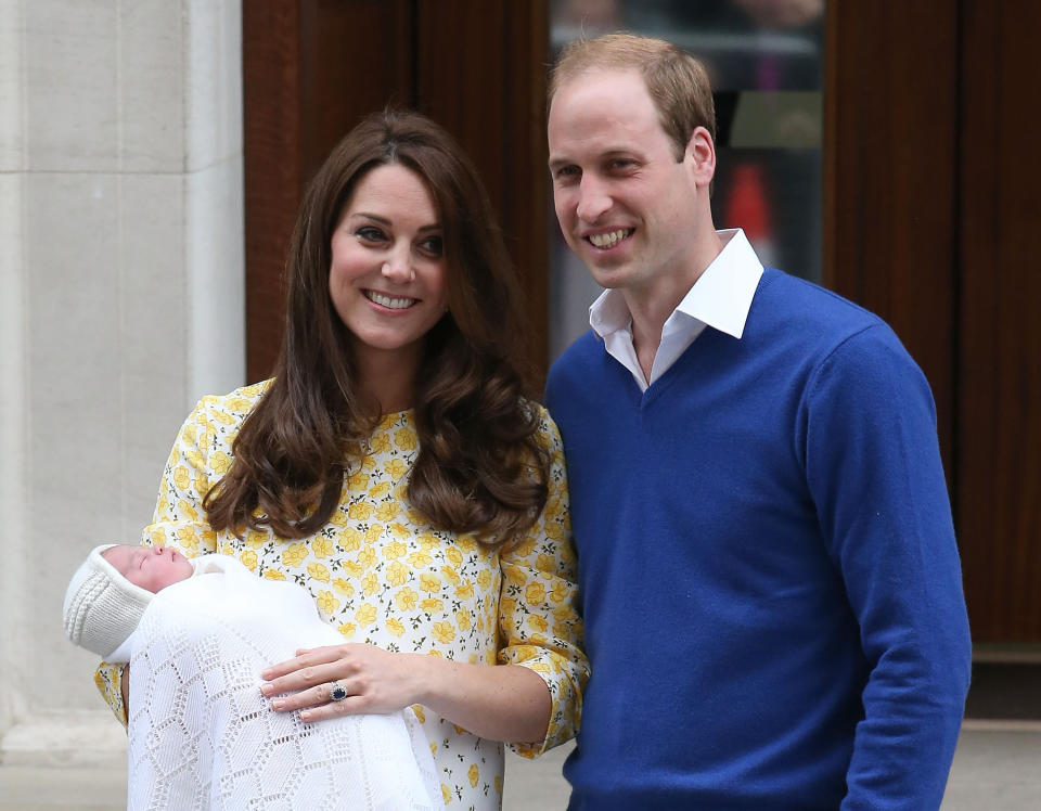 The Duke and Duchess of Cambridge emerge after the births of Prince George and Princess Charlotte [Photo: Getty]