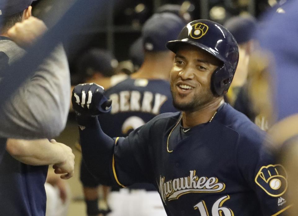 Domingo Santana gives the Brewers plenty of power in the outfield. (AP Photo)