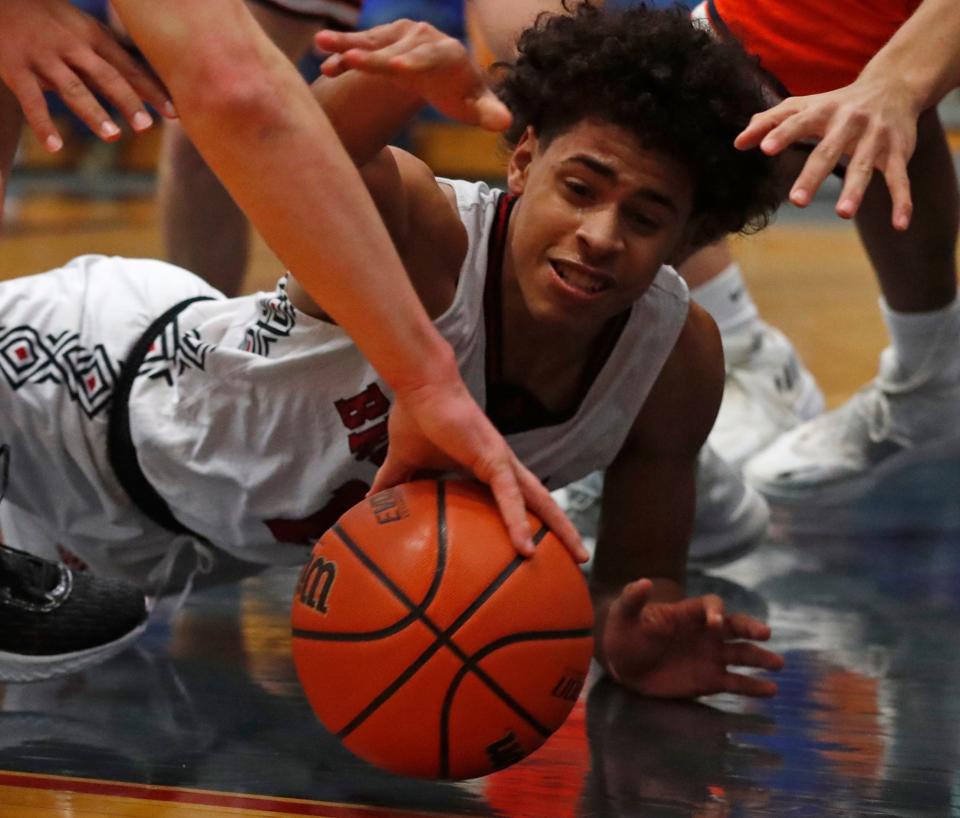 Lafayette Jeff Bronchos Devion Penny (11) goes for a loose ball during the IHSAA boy’s basketball sectional game against the Harrison Raiders, Tuesday, Feb. 28, 2023, at Memorial Gymnasium in Kokomo, Ind. Harrison won 54-39.