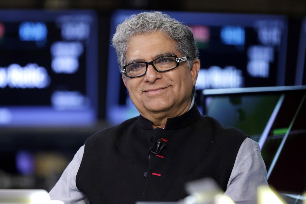 Deepak Chopra is interviewed on the floor of the New York Stock Exchange, Tuesday, June 7, 2016. (AP Photo/Richard Drew)