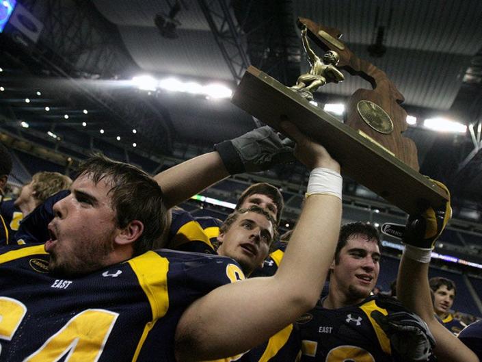 East Grand Rapids players celebrate their Division 3 state title on Nov. 27, 2007 at Ford Field.