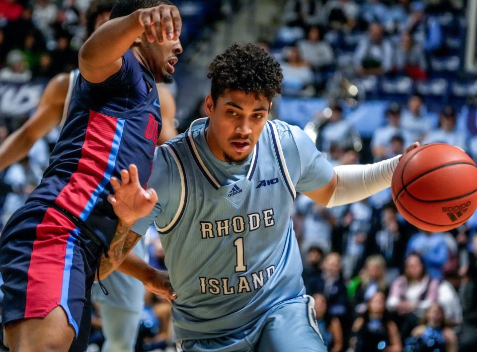 URI's Luis Kortright, defending here against a pass during a game against Duquesne earlier this season, had 23 points in a loss to Richmond last week.
