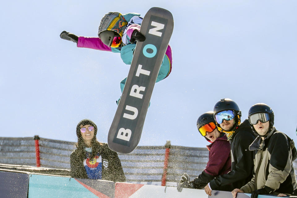 FILE - In this Feb. 26, 2019, file photo, Haku Shimasaki, 9, of Japan, throws down a huge run during the Burton US Open Snowboarding Championships in Vail, Colo. Jake Burton Carpenter, the man who changed the game on the mountain by fulfilling a grand vision of what a snowboard could be, died Wednesday night, Nov. 20, 2019, of complications stemming from a relapse of testicular cancer. He was 65. (Chris Dillmann/Vail Daily via AP, File)/Vail Daily via AP)