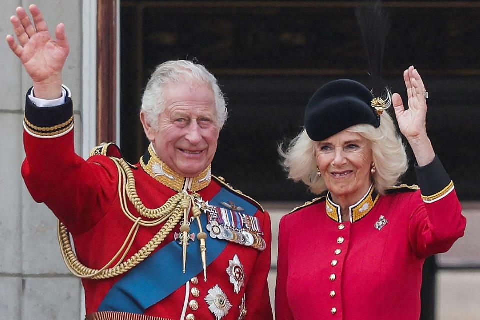 <p>ADRIAN DENNIS/AFP via Getty</p> King Charles and Queen Camilla at Trooping the Colour 2023