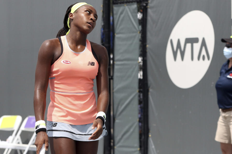 Coco Gauff reacts after a shot against Jennifer Brady during action in her WTA tennis tournament semifinal match in Nicholasville, Ky., Saturday, Aug. 15, 2020. Brady won 6-2, 6-4. (AP Photo/James Crisp)