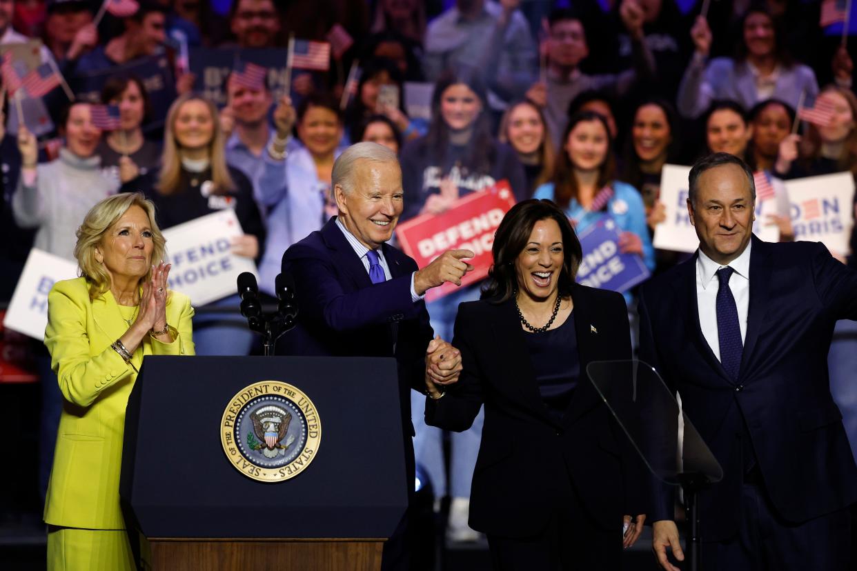 First lady Jill Biden, U.S. President Joe Biden, U.S. Vice President Kamala Harris and Second gentleman Douglas Emhoff join hands as they depart a ”Reproductive Freedom Campaign Rally" at George Mason University on January 23, 2024 in Manassas, Virginia. During the first joint rally held by the President and Vice President, Biden and Kamala Harris spoke on what they perceive as a threat to reproductive rights.