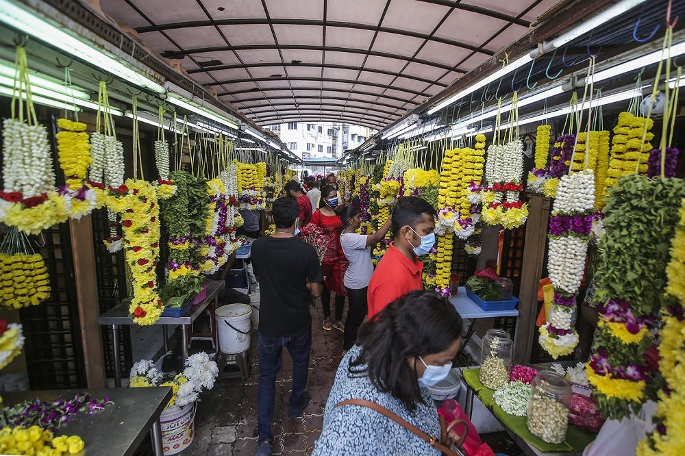 People shop for the upcoming Deepavali celebration in Brickfields November 12, 2020. — Picture by Hari Anggara