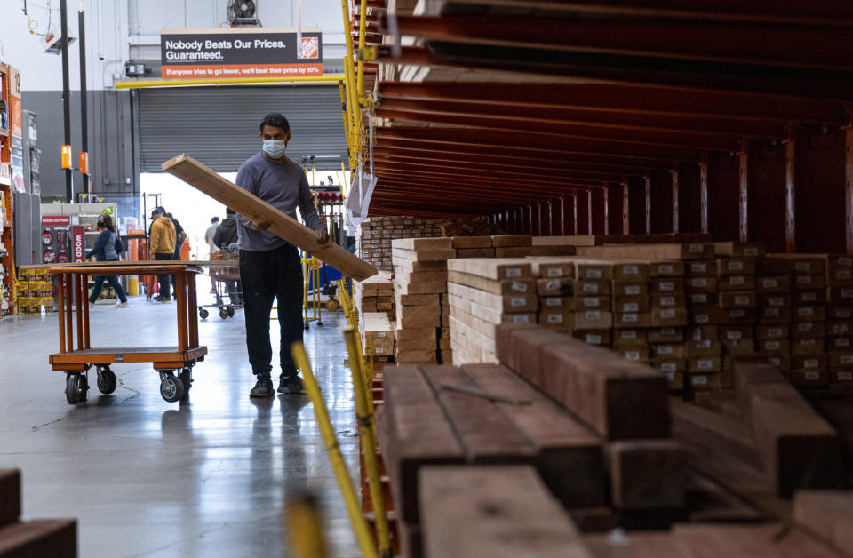 Image: A customer loads lumber at Home Depot (David Paul Morris / Bloomberg via Getty Images file)
