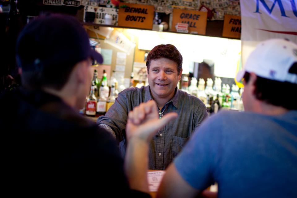 Actor Sean Astin talks with a couple bar patrons during an appearance at Corby's on Sept. 21, 2012, in South Bend. Astin, who has stared in "The Goonies" and The Lord of the Rings trilogy, played the title role in "Rudy," the 1993 movie about a Notre Dame football walk-on.