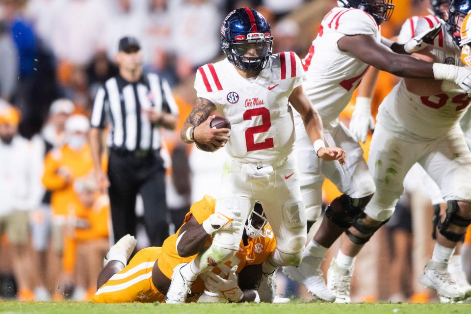 Mississippi quarterback Matt Corral carries the ball against Tennessee during their game at Neyland Stadium in Knoxville, Tenn.