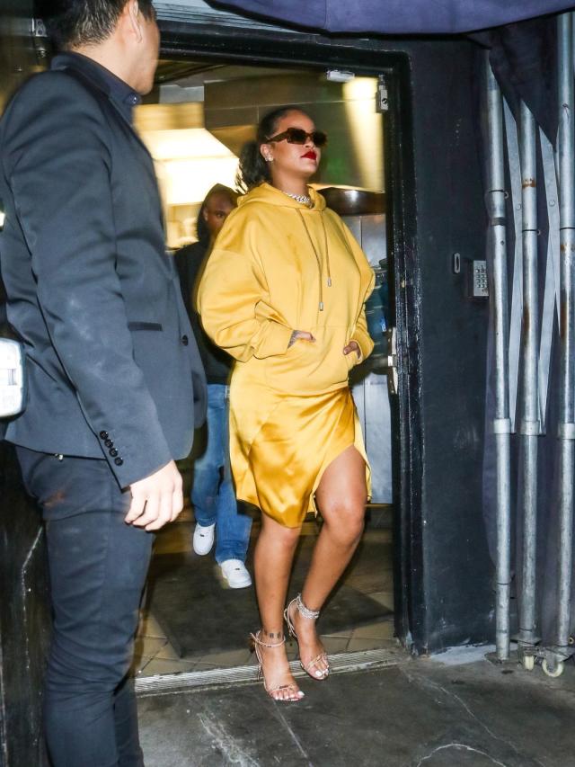 Rihanna at Fenty Beauty event in Dubai wearing an Oscar de la Renta coat  dress.