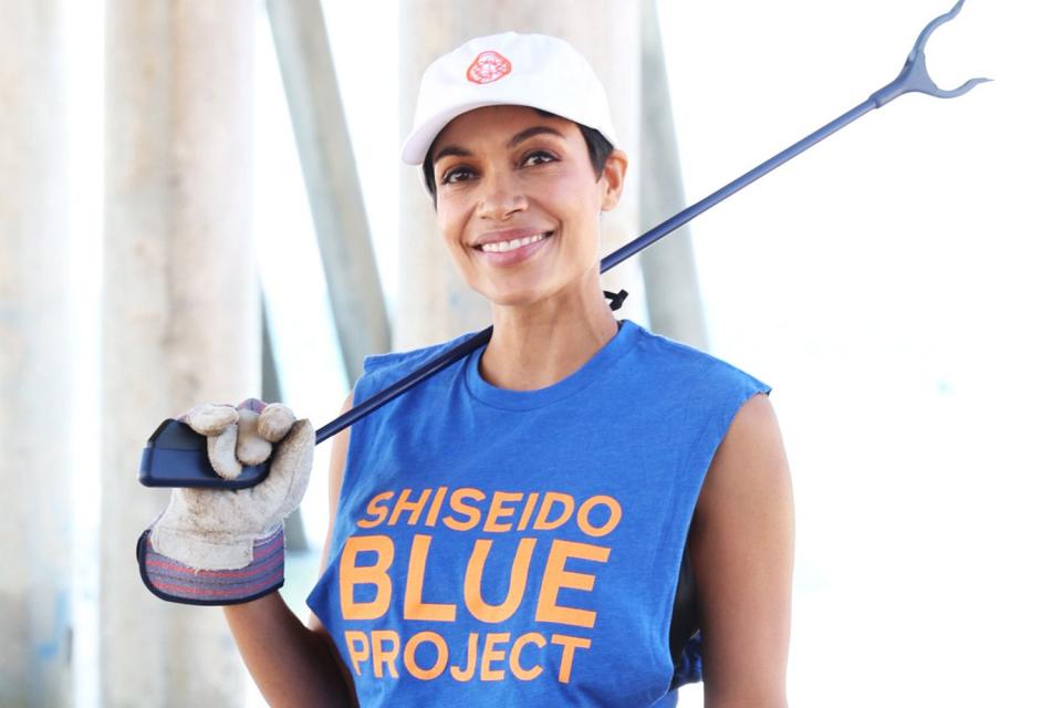 <p>Phillip Faraone/Getty</p> Rosario Dawson poses at Beach Clean-Up 2023