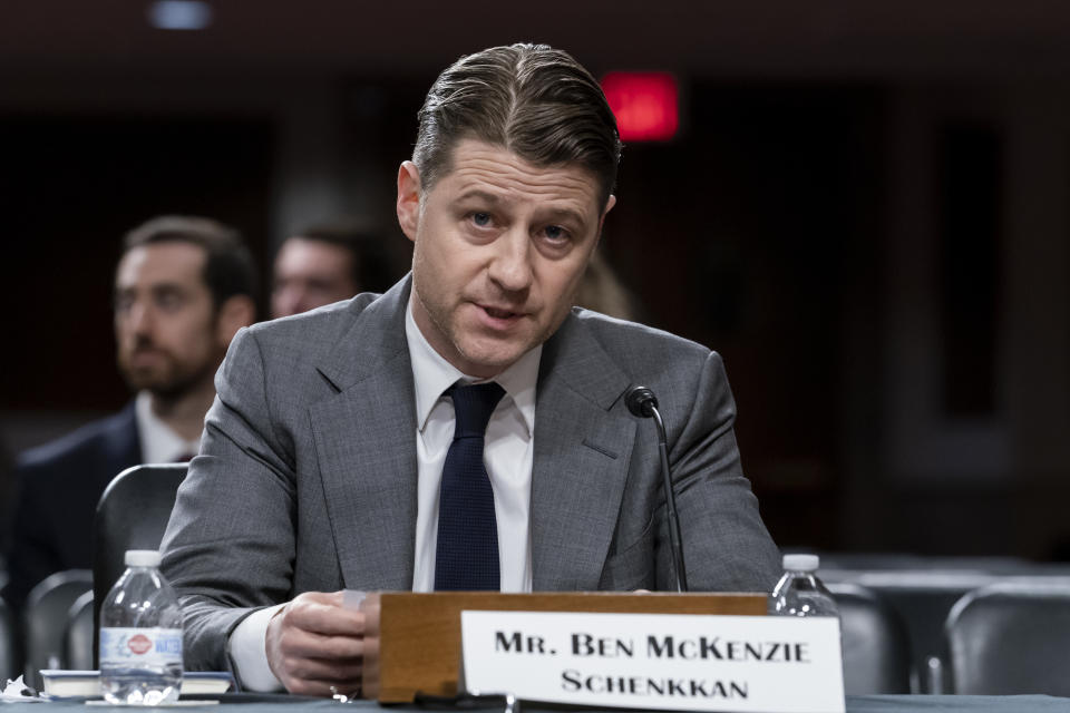 Actor Ben McKenzie testifies during a Senate Banking Committee hearing on cryptocurrency and the collapse of the FTX crypto exchange and its founder Sam Bankman-Fried, at the Capitol in Washington, Wednesday, Dec. 14, 2022. (AP Photo/J. Scott Applewhite)