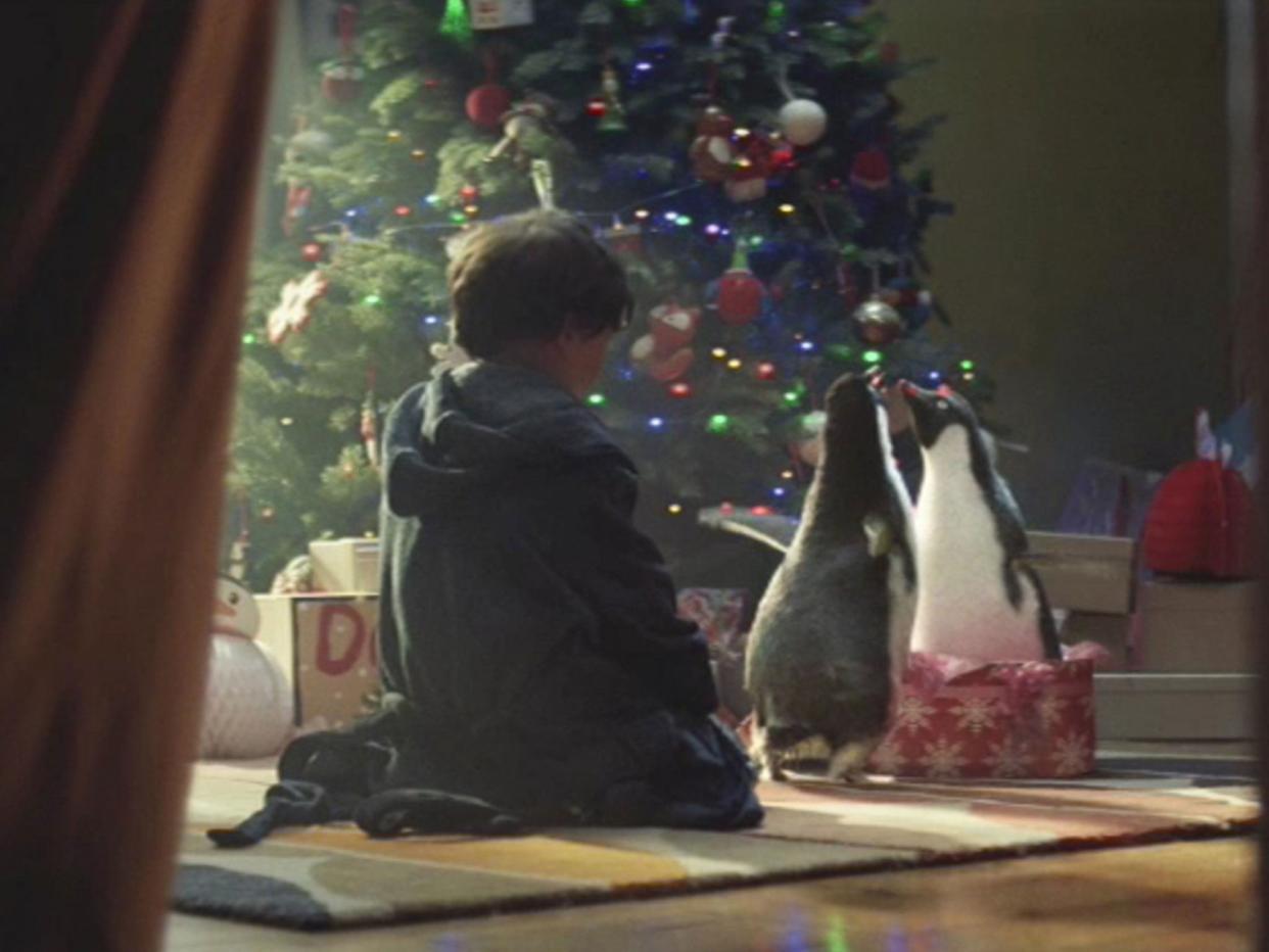 Pick up a penguin: John Lewis’s emotional ‘story’ is part of a £7m festive store campaign (PA)