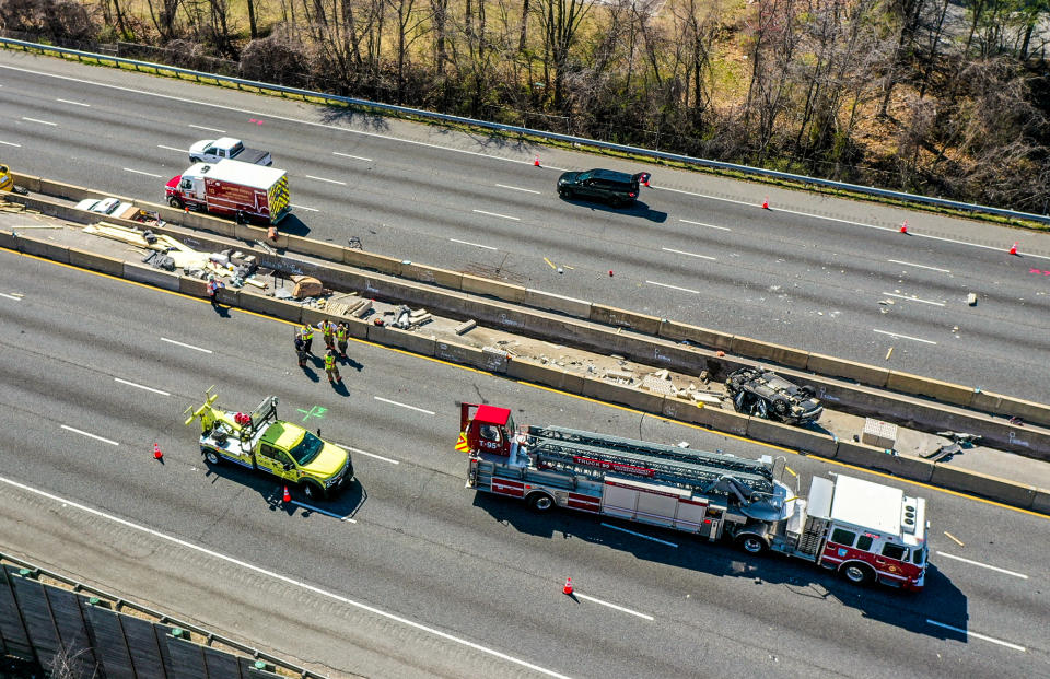 Police investigate a deadly accident between Security Road and Liberty Road on March 22, 2023, near Lochhearn, Md. (Jerry Jackson / Baltimore Sun via Getty Images)