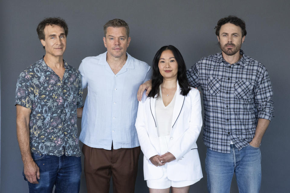 Director Doug Liman, left, poses with actors, Matt Damon, from second left, Hong Chau, and Casey Affleck to promote the film "The Instigators" on Friday, July 26, 2024, in Boston. (AP Photo/Reba Saldanha)