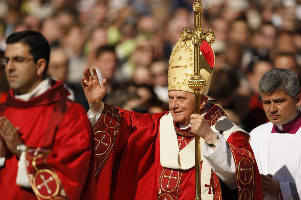 FILE - Pope Benedict XVI arrives for his Papal Mass, Thursday, April 17, 2008, at Washington Nationals baseball Park in Washington. In the the United States, admirers of Pope Emeritus Benedict XVI remembered him warmly for his theological prowess and devotion to traditional doctrine. However, some U.S. Catholics, on learning of his death Saturday, Dec. 31, 2022, recalled him as an obstacle to progress in combating clergy sex abuse and expanding the role of women in the church.(AP Photo/Gerald Herbert, File)