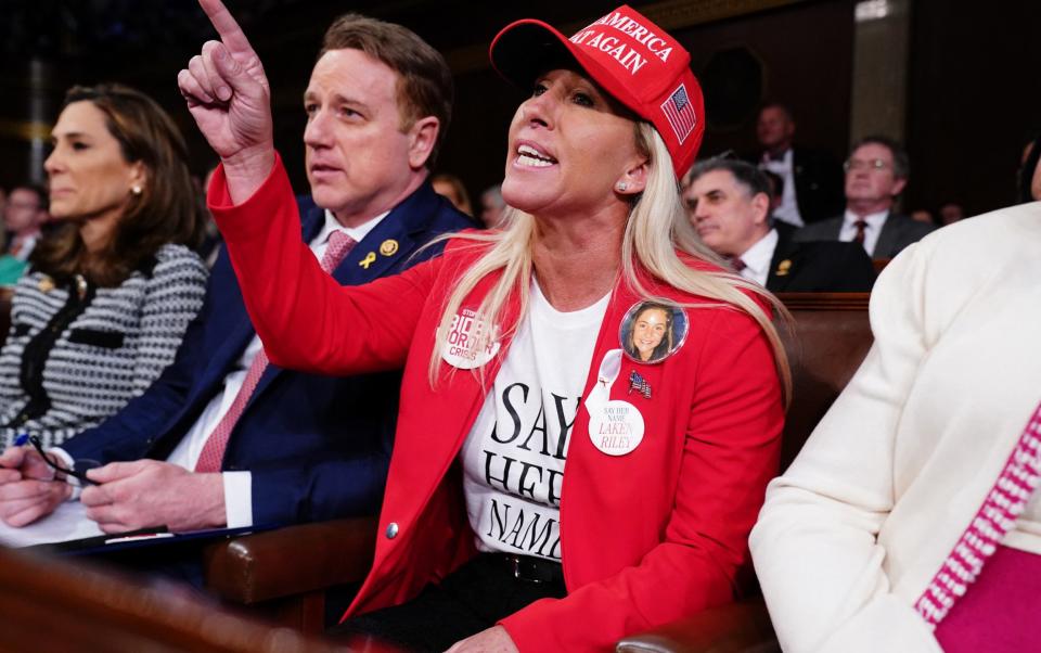 Representative Marjorie Taylor Greene, a close ally of Donald Trump, heckled the president