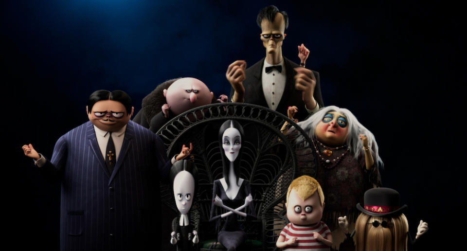 (L to R) Oscar Isaac as the voice of Gomez Addams, Chloë Grace Moretz as the voice of Wednesday Addams, Nick Kroll as the voice of Uncle Fester, Charlize Theron as the voice of Morticia Addams, Conrad Vernon as the voice of Lurch, Javon Walton as the voice of Pugsley Addams, Bette Midler as the voice of Grandma, and Snoop Dogg as the voice of It in The Addams Family 2. (Still: United International Pictures)