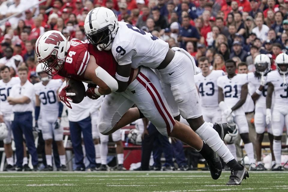 Wisconsin's Jake Ferguson catches a pass in front of Penn State's Joey Porter Jr. during the first half of an NCAA college football game Saturday, Sept. 4, 2021, in Madison, Wis. (AP Photo/Morry Gash)