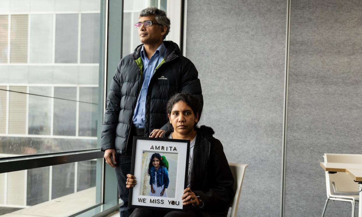 <span>Chandra Sekhar Lanka and Satya Tarapureddi, the parents of eight-year-old Amrita Lanka who died at Monash children’s hospital in 2022.</span><span>Photograph: Diego Fedele/AAP</span>