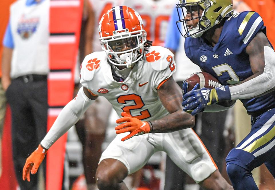 Clemson cornerback Fred Davis II (2) chases Georgia Tech running back Hassan Hall (3) during the first quarter at the Mercedes-Benz Stadium in Atlanta, Georgia Monday, September 5, 2022.