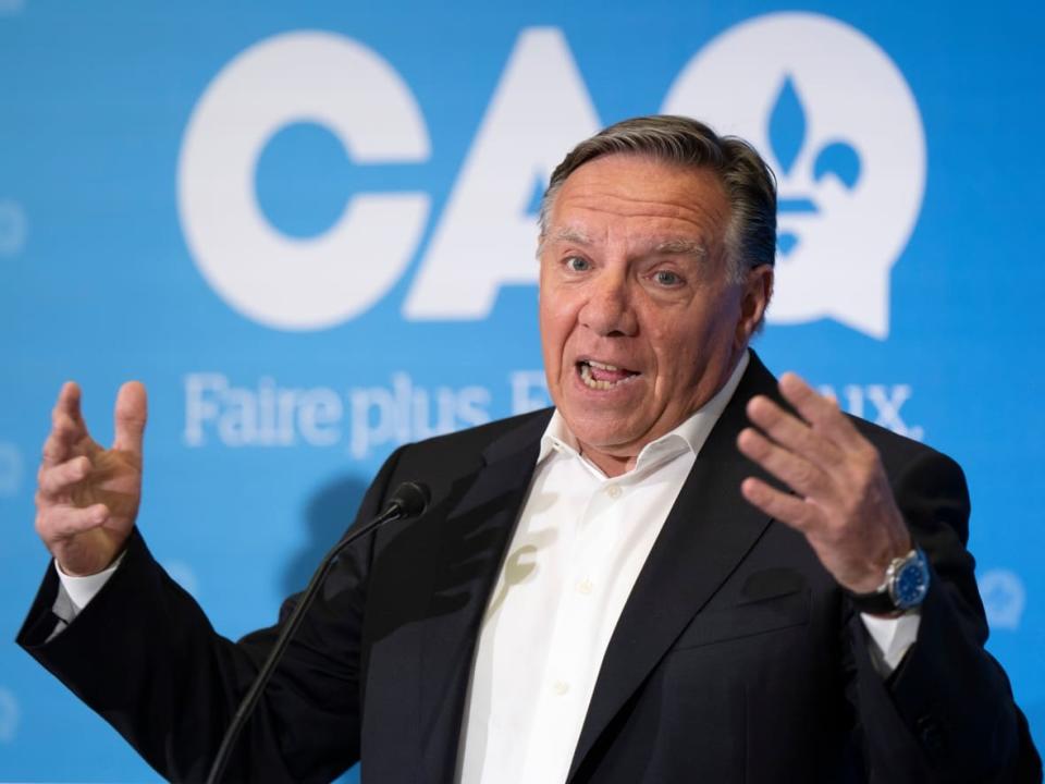 Quebec Premier François Legault is pictured at a news conference on July 21, 2022. The CAQ leader unveiled his party's slogan Friday ahead of the Oct. 3 election.  (Ryan Remiorz/The Canadian Press - image credit)