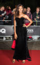 <p>Former Victoria's Secret model Jourdan Dunn vamped up her look with a Hollywood-inspired soft curl and a black sweetheart neckline strapless gown with red detailing for the awards show </p>