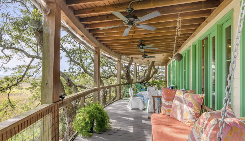 The house has numerous patios to enjoy the march scenery and coastal breezes.