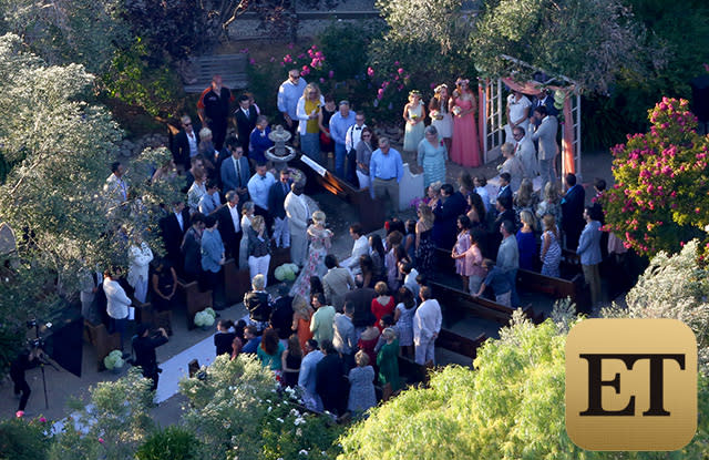 Who's got the tissues? There was hardly a dry eye on the ranch when Jennie Garth married actor-producer Dave Abrams at her farmhouse in Los Olivos, Calif., Saturday evening. <strong>NEWS: Jennie Garth Marries Dave Abrams</strong> The blushing bride, decked out in a floral-embroidered gown with a sheer long-sleeve overlay -- looked extremely happy but a little nervous as she walked down the aisle solo, a source tells ET. She had no reason to be concerned, though -- Abrams, looking sharp in a light gray suit, lit up as soon as he saw his bride-to-be in her wedding gown for the first time. FameFlynet FameFlynet Aw! Everything about the wedding was traditional and intimate, from the close friends and family in attendance at Garth's Santa Ynez Valley home to all three of Jennie's daughters -- Luca Bella, 17, Lola Ray, 12, and Fiona Eve, 8 -- looking on as her beautiful, excited bridesmaids. FameFlynet FameFlynet <strong>PHOTOS: Gorgeous Celeb Wedding Dresses </strong> The most poignant part of the wedding, however, was when it came time to exchange vows. Both bride and groom stood in front of a white archway framed by peach tulle and flowers and clutched folders as they shared their own "very emotional" vows, the source said. Garth even had to dry her eyes at one point during Abrams' speech. FameFlynet FameFlynet After Garth and Abrams were declared man and wife, all of the attendees jumped to their feet to congratulate the newly married couple. The doting duo gave the bridesmaids, who were sporting adorable floral headbands, big hugs, embracing them as they walked to an open area of the ranch to take official wedding photos. FameFlynet ETONLINE Guests were treated to a reception full of rustic elegance, with chic, simple white shades, lawn lamps and dividers framing the yard and white linens and plates placed on dark wooden picnic tables to add to the cozy feel. FameFlynet Romance stayed in the air (but how could it not?) as the couple stepped into the spotlight to dance to Elton John's "Your Song," which is about as sweet a song as one can pick. <strong>WATCH: Third Times the Charm for These 9 Lovesick Celebrities </strong> There was plenty of fun music for all of the attendees to dance to as well, with the party going strong to lovestruck tunes like The Eagles' "Best of My Love," The Four Tops' "Ain't No Woman (Like the One I've Got)," John Legend's "P.D.A. (We Just Don't Care)" and Michael Jackson's "Rock With You." Who were some of the fabulous attendees dancing the night away? They included Garth's BFFs, of course, like her <em>Beverly Hills, 90210</em> co-star Tori Spelling. While her husband Dean McDermott and fellow <em>90210</em> castmates weren't at the ranch, Spelling still had an amazing time celebrating Garth's nuptials alongside costume designer Erik Rudy and actor Miguel Pinzon. FameFlynet While he couldn't be in attendance, ET caught up with Ian Ziering at Comic-Con in San Diego on Saturday, and he shared his love and well wishes for his <em>90210</em> co-star on her special day. "Jennie is such a special person," he said. "She's so fantastic. I was hoping that she’d be able to find love again, and knowing her, I'm not surprised that it's happened." <strong>PHOTOS: Inside Vanessa Williams' Lavish Wedding </strong> Third time was definitely the charm for Garth, who was previously married to <em>Twilight</em> star Peter Facinelli -- with whom she has Luca, Lola and Fiona -- from 2001 to 2013 and Daniel Clark from 1994 to 1996. Garth and Abrams met on a blind date last fall and got engaged in April. There are even more big celeb weddings coming up this summer and fall -- find out which ones we're most excited for in the video below.