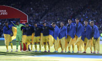 Ukrainian players ahead of the World Cup 2022 qualifying play-off soccer match between Scotland and Ukraine at Hampden Park stadium in Glasgow, Scotland, Wednesday, June 1, 2022. (AP Photo/Scott Heppell)