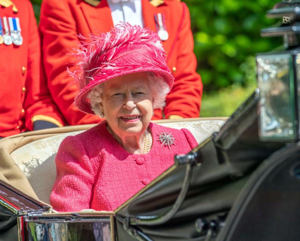 <p>Queen Elizabeth chose a vibrant pink ensemble for the races today.</p>