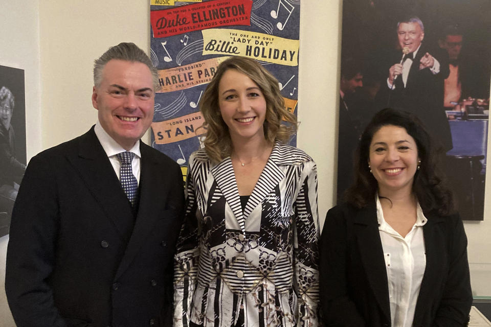 From left, Vienna Philharmonic violinist and chairman Daniel Froschauer, clarinetist Andrea Goetsch and harpist Anneleen Lenaerts pose for a photograph on Feb. 29, 2024 at Carnegie Hall in New York. A male bastion from its founding in 1842 until 1997, the Vienna Philharmonic has 24 female players among 145 members with three vacancies as it tours the United States this week. (AP Photo/Ron Blum)