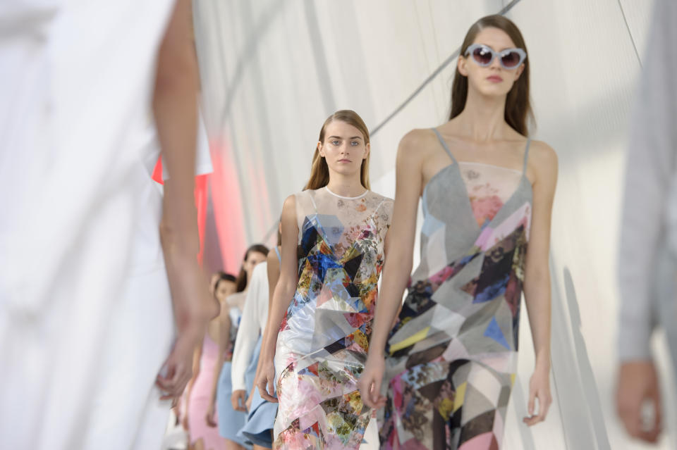 Models wear designs created for Preen by Thornton Bregazzi during London Fashion Week Spring/Summer 2014, at the Natural History Museum in central London, Sunday, Sept. 15, 2013. (Photo by Jonathan Short/Invision/AP)