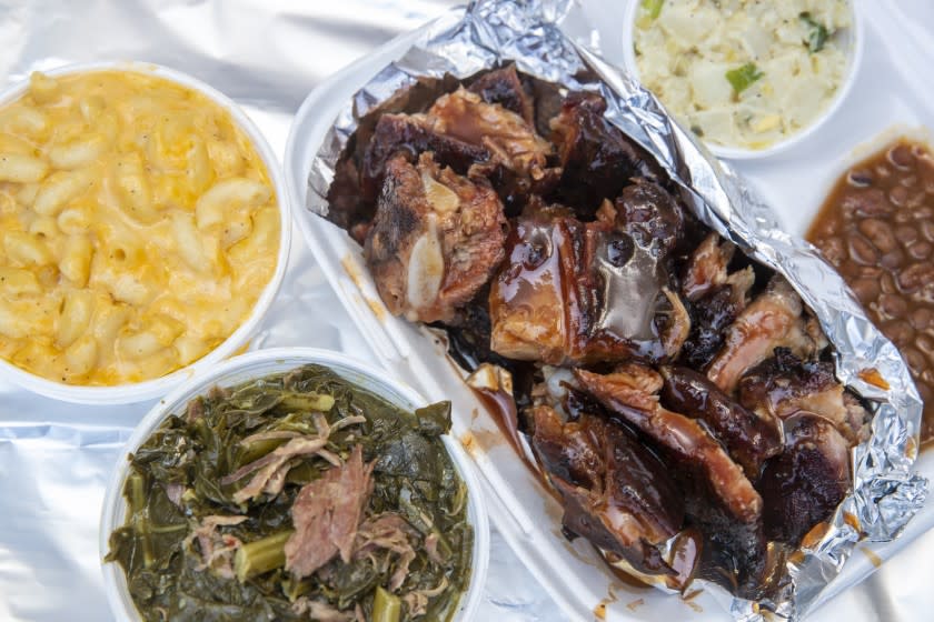 LOS ANGELES, CA - JUNE 27: Rib tip plate with potato salad and house beans, along with sides of macaroni and cheese and greens at Lonnie and Regina Edwards' Ribtown BBQ on Saturday, June 27, 2020 in Los Angeles, CA. (Brian van der Brug / Los Angeles Times)