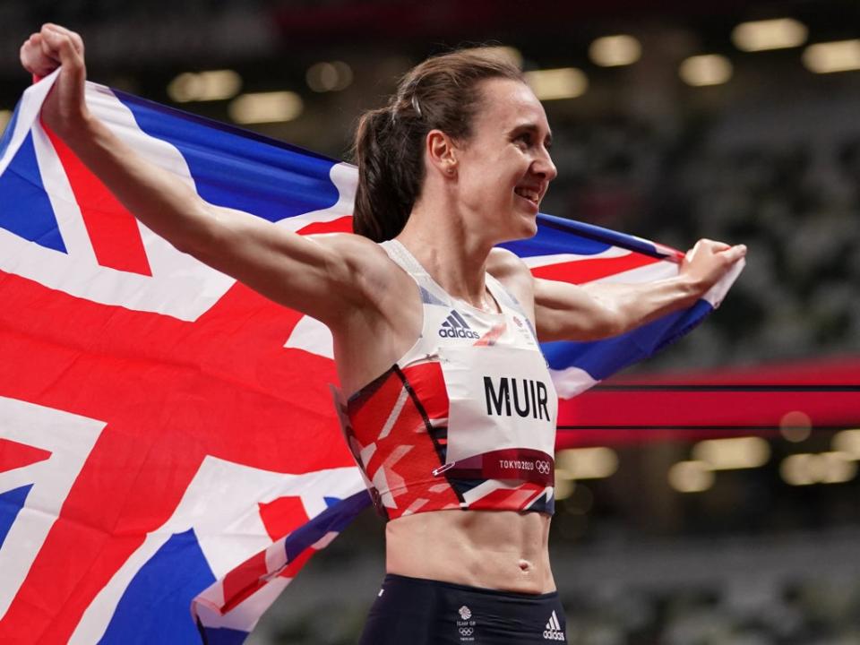 Laura Muir celebrates her silver medal-winning run (PA)