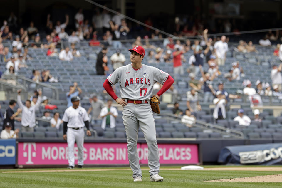 Los Angeles Angels pitcher Shohei Ohtani reacts after giving up a home run to New York Yankees' Gleyber Torres during the first inning of the first baseball game of a doubleheader on Thursday, June 2, 2022, in New York. (AP Photo/Adam Hunger)