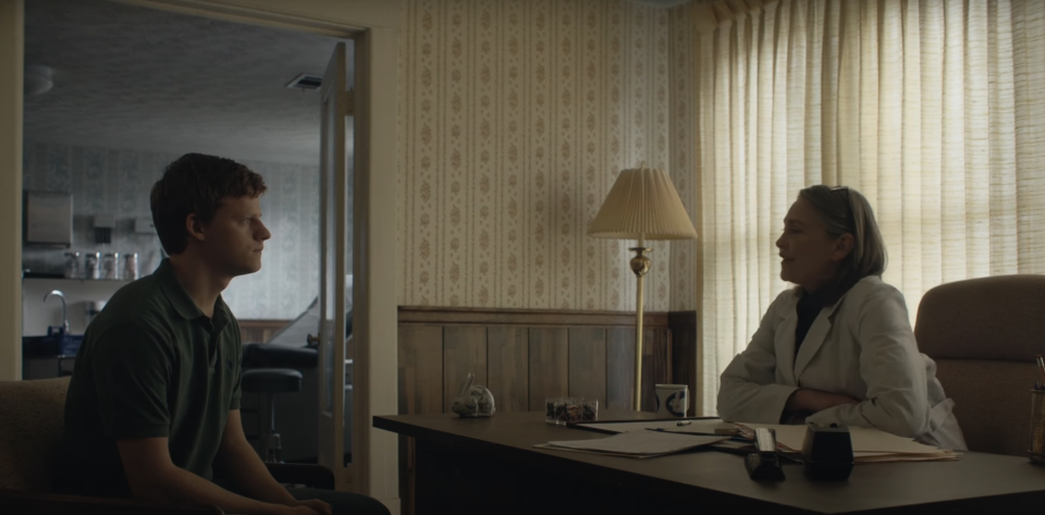 teen talking to a woman behind a desk