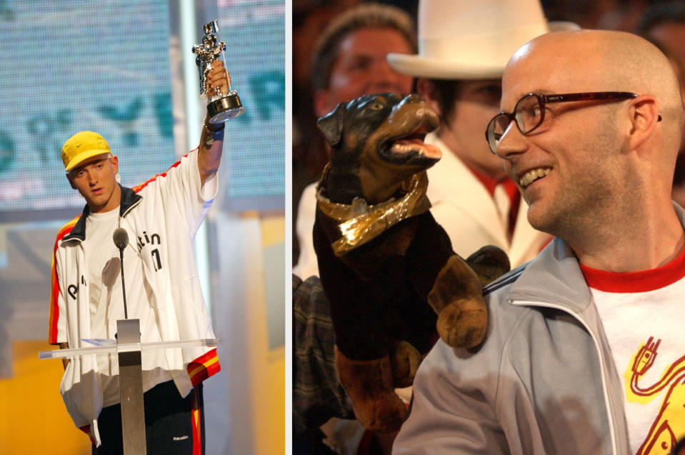 Eminem at the podium holding up and award and Moby in the audience smiling at Triumph the Insult Comic Dog