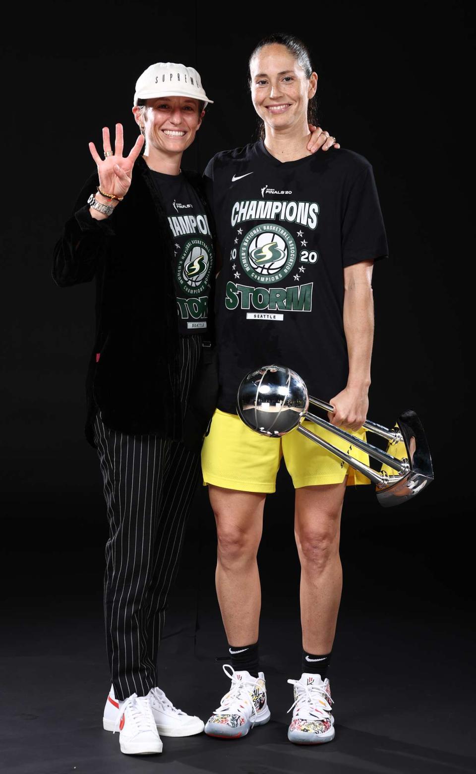 Megan Rapinoe and Sue Bird #10 of the Seattle Storm poses for a portrait with the WNBA Championship Trophy after winning Game 3 of the 2020 WNBA Finals against the Las Vegas Aces on October 6, 2020 at Feld Entertainment Center in Palmetto, Florida. NOTE TO USER: User expressly acknowledges and agrees that, by downloading and/or using this Photograph, user is consenting to the terms and conditions of the Getty Images License Agreement. Mandatory Copyright Notice: Copyright 2020 NBAE