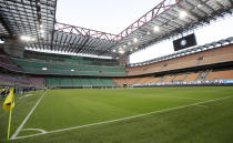 FILE - In this Wednesday, June 24, 2020 filer, Inter Milan and Sassuolo players observe a minute of silence for the victims of coronavirus before the Serie A soccer match between Inter Milan and Sassuolo at the San Siro Stadium, in Milan, Italy. For players, the pandemic has meant a congested season that poses fitness challenges, let alone trying to avoid coronavirus infections. Financially playing the delayed tournament is essential for UEFA. For fans, the EURO 2020 24-team event should be the first chance for the widespread return of fans to stadiums across Europe since March 2020, assuming new restrictions aren't imposed. (AP Photo/Luca Bruno, File)