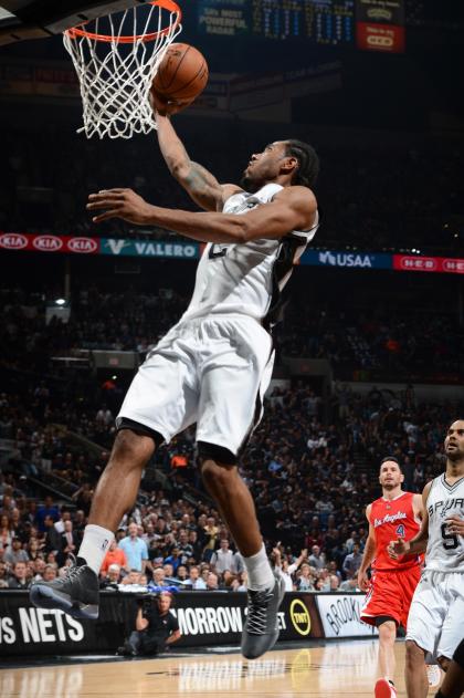 SAN ANTONIO - APRIL 24: Kawhi Leonard #2 of the San Antonio Spurs goes up for a shot against the Los Angeles Clippers during Game Three of the Western Conference Quarterfinals at the AT&T Center on April 24, 2015 in San Antonio, Texas