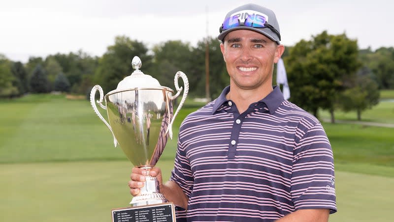 Derek Fribbs from Aurora, Colorado, poses with the first-place trophy after winning the Utah Open at Riverside Country Club in Provo on Sunday, Aug. 18, 2024.