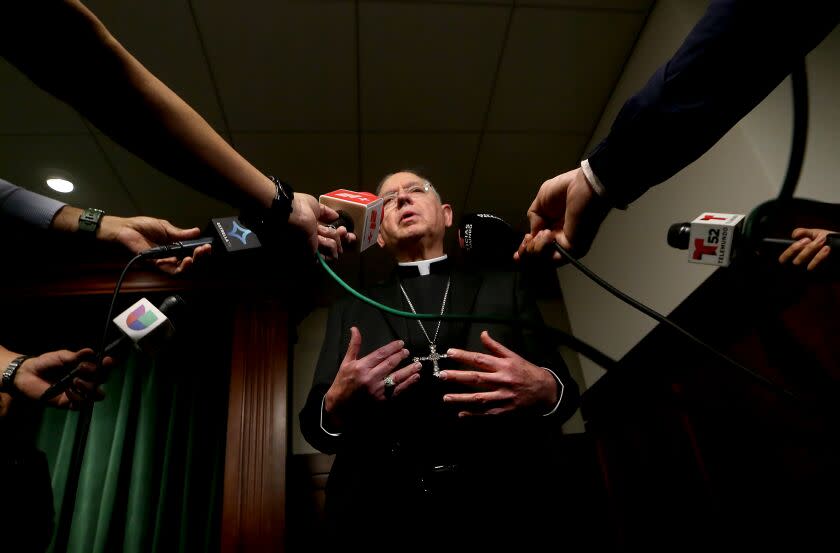 LOS ANGELES, CALIF. - FEB. 20, 2023. Los Angeles Archbishop Jose Gomez talks with reporters during a press conference in downtown Los Angeles on Monday, Feb. 20, 2023, to announce the arrest of a suspect in the murder of Roman Catholic Bishop David O'Connell. Authorities took 65-year-old Carlos Medina into custody early Sunday morning. He is the husband of the housekeeper where O'Connell lived. (Luis Sinco / Los Angeles Times)