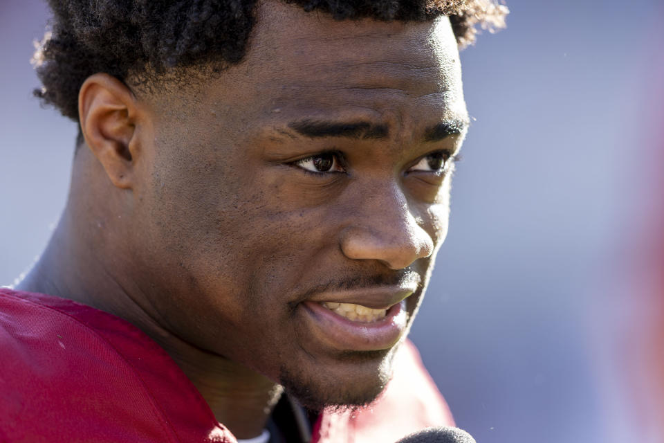 Alabama quarterback Jalen Milroe (4) talks with the media after an NCAA college football game against Chattanooga, Saturday, Nov. 18, 2023, in Tuscaloosa, Ala. (AP Photo/Vasha Hunt)