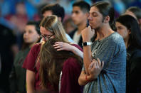 Marjory Stoneman Douglas High School students listen to sheriff Scott Israel speak before a CNN town hall meeting at the BB&T Center, in Sunrise, Florida, U.S. February 21, 2018. REUTERS/Michael Laughlin/Pool