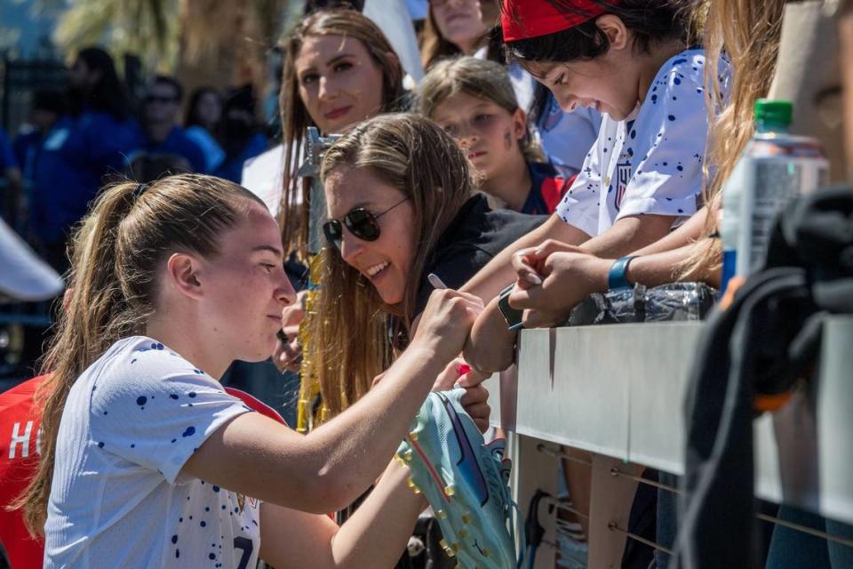 Sofia Huerta signs autographs with fans after the U.S.’s final World Cup tuneup July 9 against Wales.